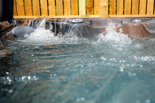 The garden hot tub used by the Hayloft guests